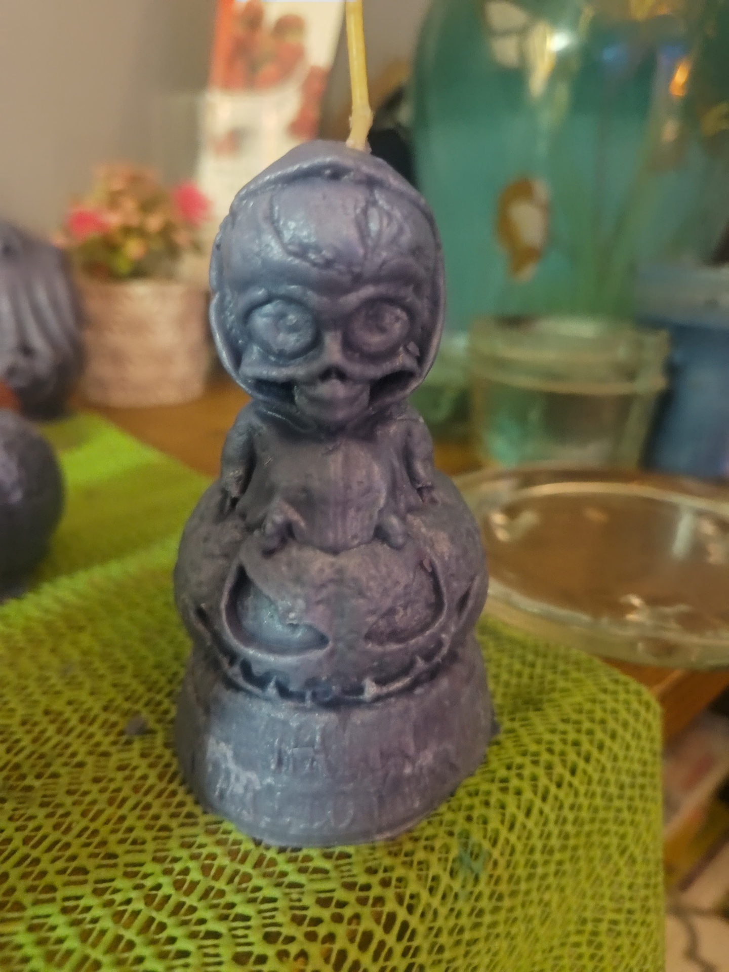 Skull-on-Pumpkin — Indigo handmade beeswax candle by Flickering Fortunes